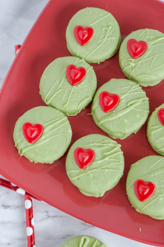 Above view of several No Bake Grinch Cookies on a plate