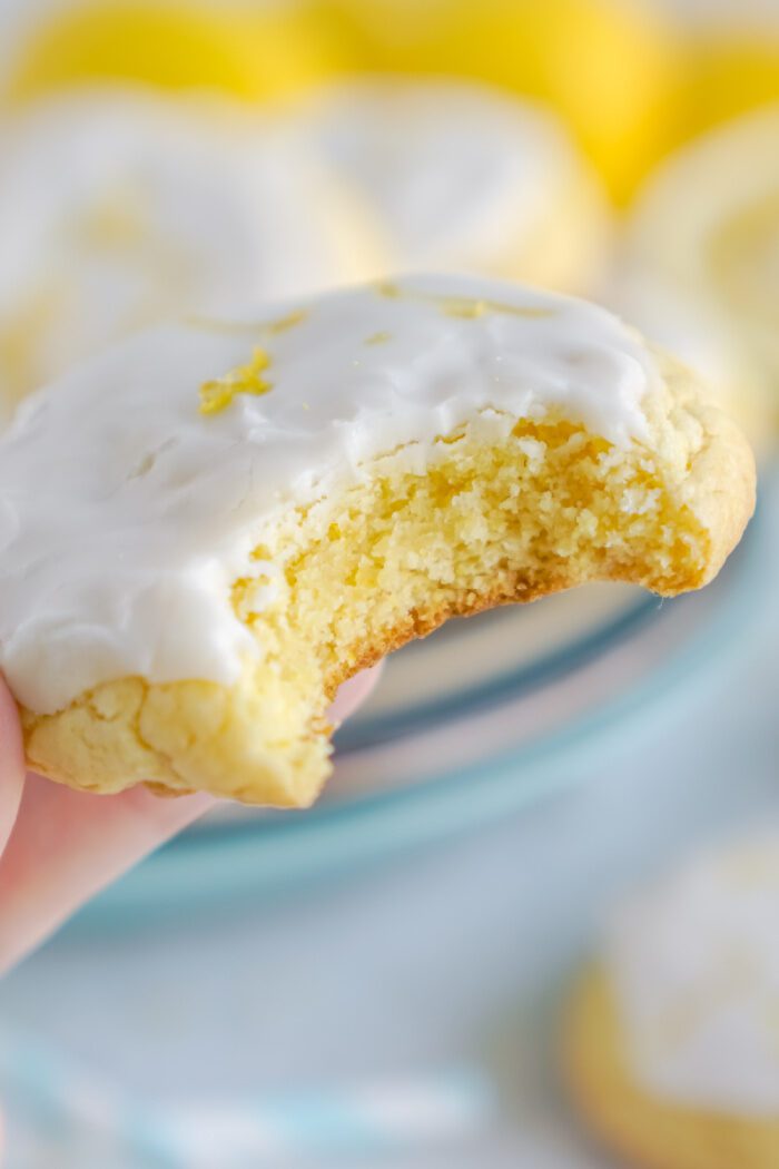 Close up view of someone holding a Lemon Cake Mix Cookie