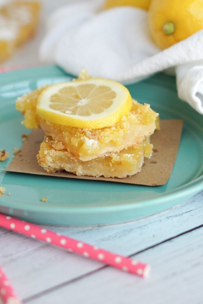 Stack of 2 Lemon Bars with a lemon slice on top