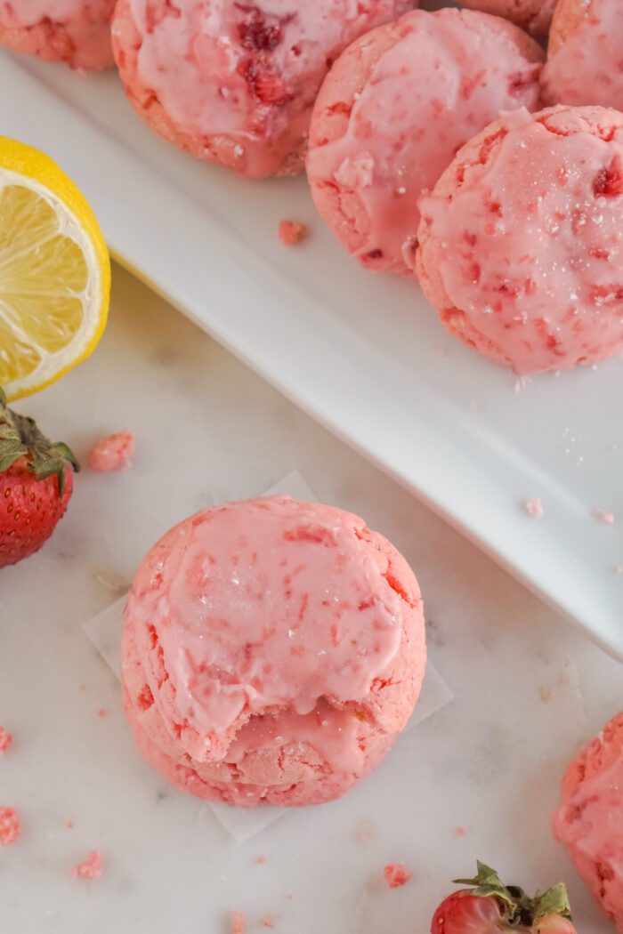 Above view of a plate and a stack of Strawberry Cake Mix Cookies