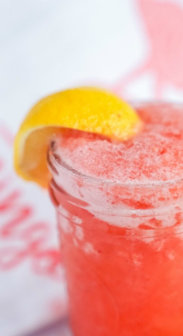 Glass of Strawberry Lemonade with a lemon slice on it