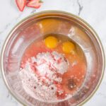 Eggs, cake mix, oil and vanilla in a bowl