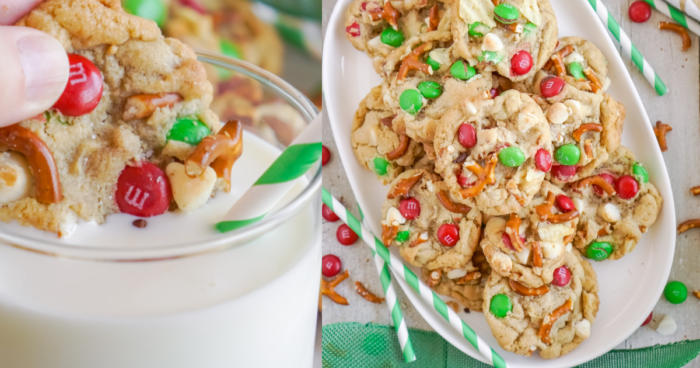 Plate of Kitchen Sink Christmas Cookies and one being dunked into a glass of milk