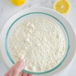 Lemon cake mix added to bowl