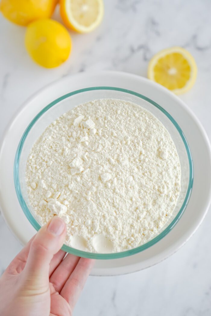 Lemon cake mix added to bowl