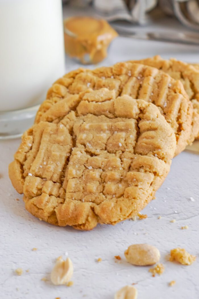 Peanut Butter Cookies in a line leaning on each other