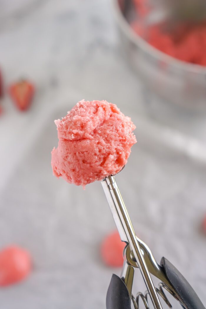 Strawberry cookie dough in a cookie scoop