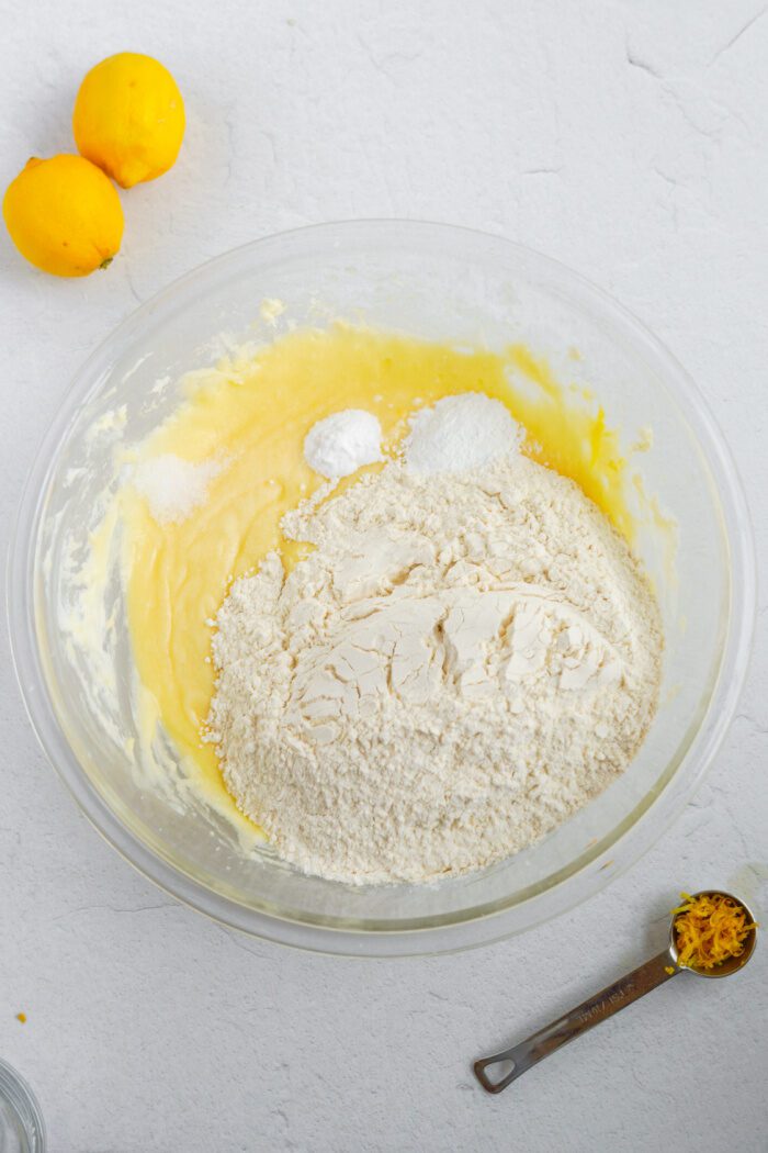 Dry ingredients being added to lemon sugar cookie bars batter