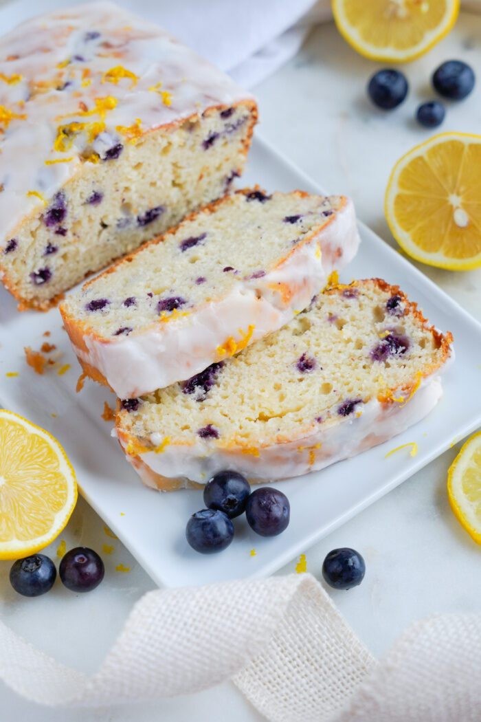 Slices of Lemon Blueberry Loaf propped up on each other