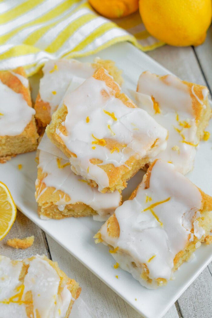 Several Lemon Sugar Cookie Bars on a plate