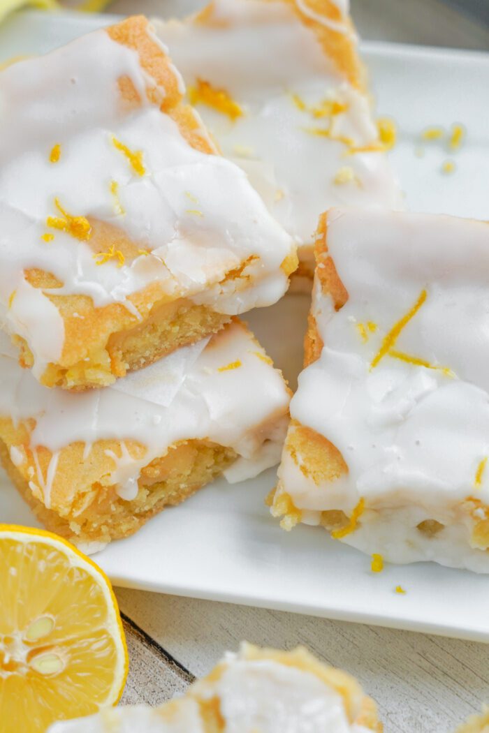 Close up view of Lemon Sugar Cookie Bars on a plate