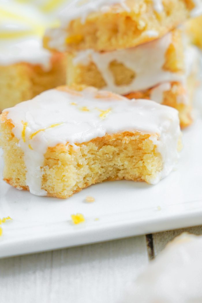 Lemon Sugar Cookie Bars with a bite taken out of it