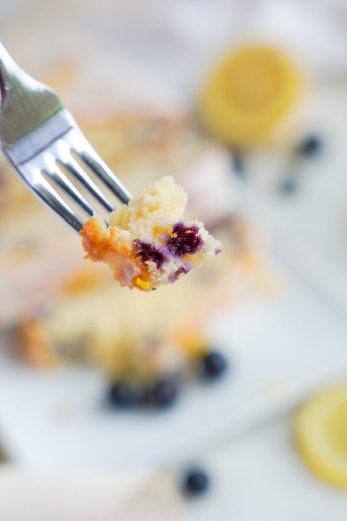 A bite of Lemon blueberry loaf on a fork