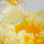 Lemon juice being added to batter