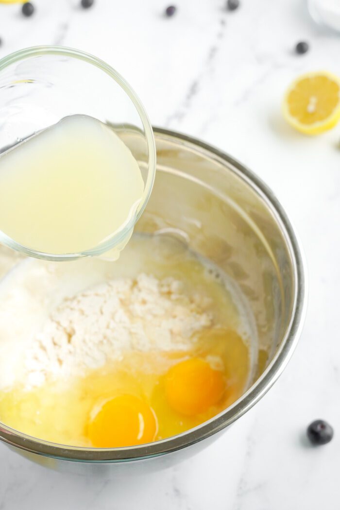 Lemon juice being added to the bowl