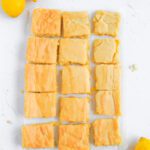 Lemon sugar cookie bars cut into squares