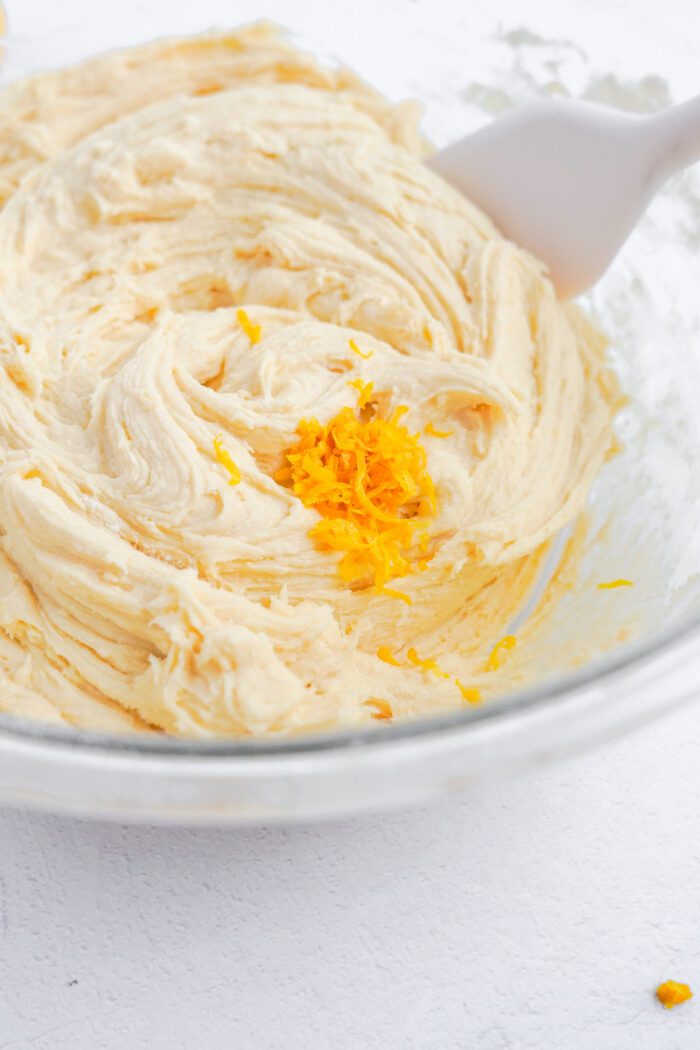 Lemon zest being added to batter