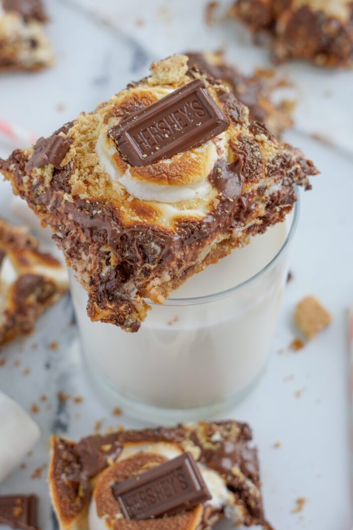 S'mores Magic Bar on top of a glass of milk