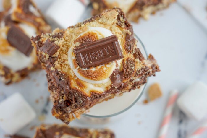 S'mores Bar sitting on top of glass of milk