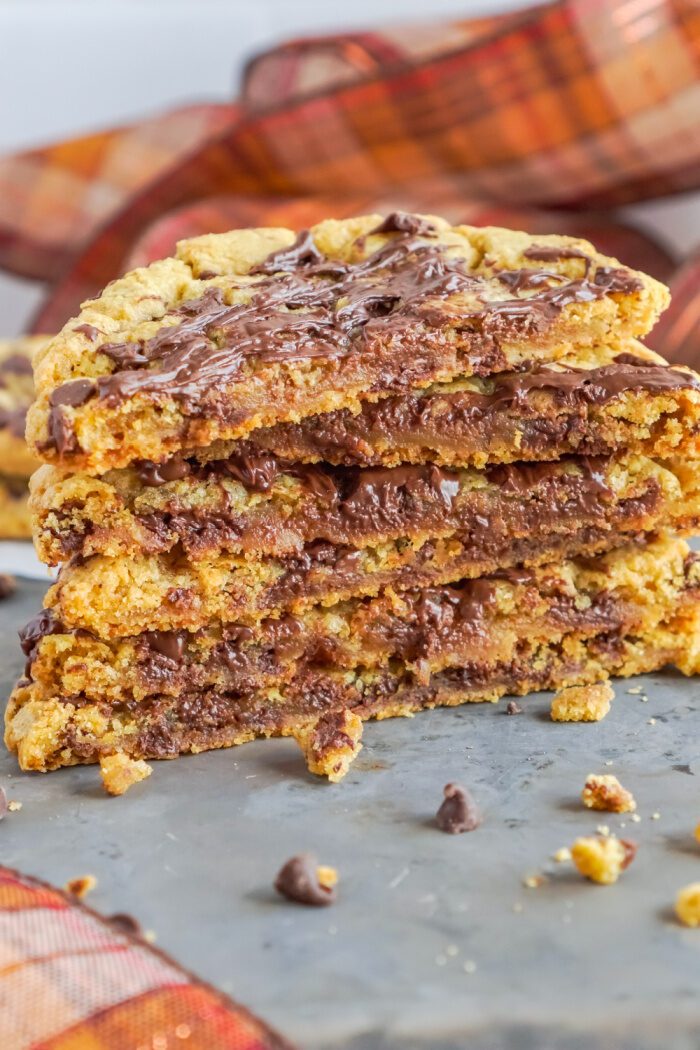 Chocolate Chip Pumpkin Cookies stacked and sliced in half