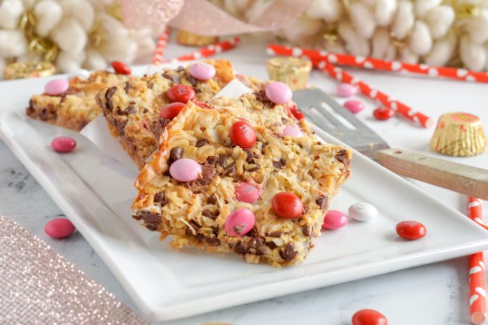 Several Valentine's Day Magic Bars on a plate