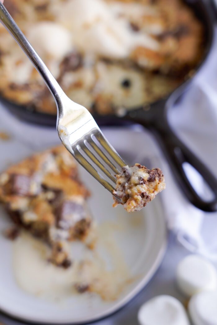 A bite of S'mores Chocolate Chip Skillet Cookie on a fork