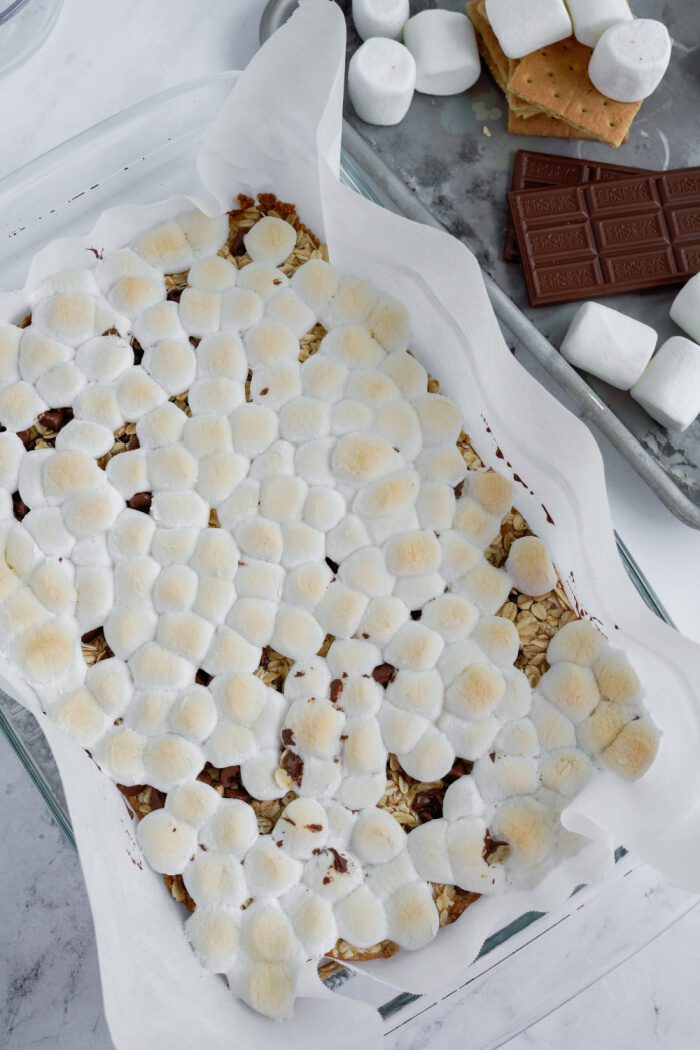 Mini Marshmallows melted on top of S'mores Bars