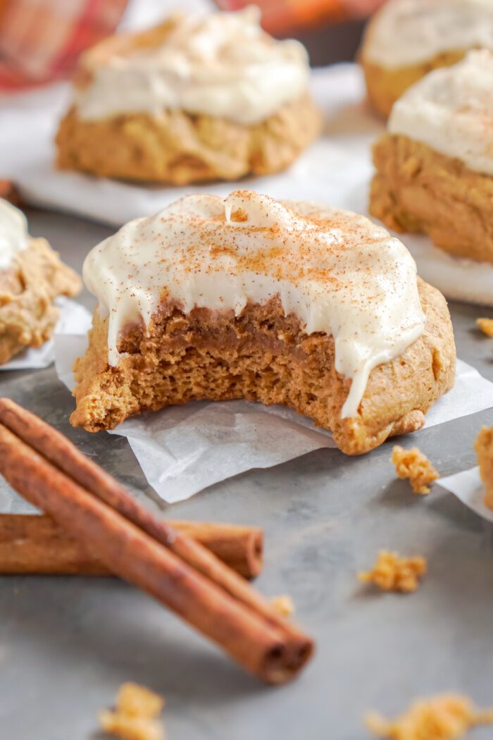 Pumpkin Cake Mix Cookie with a bite taken out of it