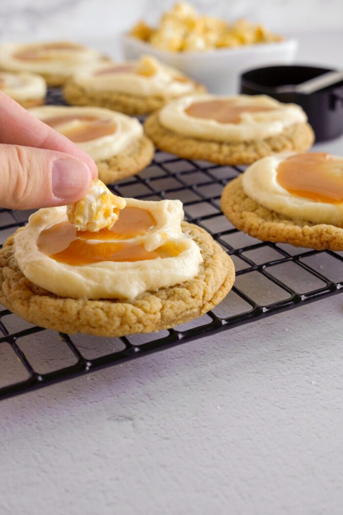 Caramel Popcorn Cookie topped with Caramel frosting and popcorn