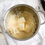 Sweetened condensed milk added to pot