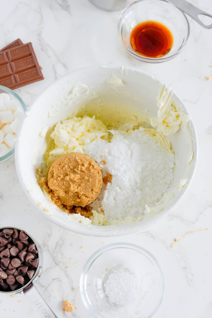 Powdered sugar and brown sugar added to the bowl