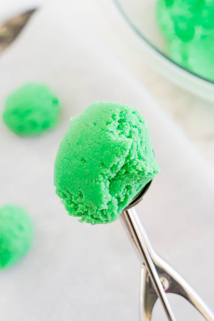 A scoop of green cookie dough.