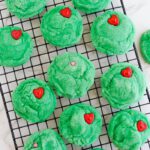 Grinch Sugar Cookies on a Cooling Rack