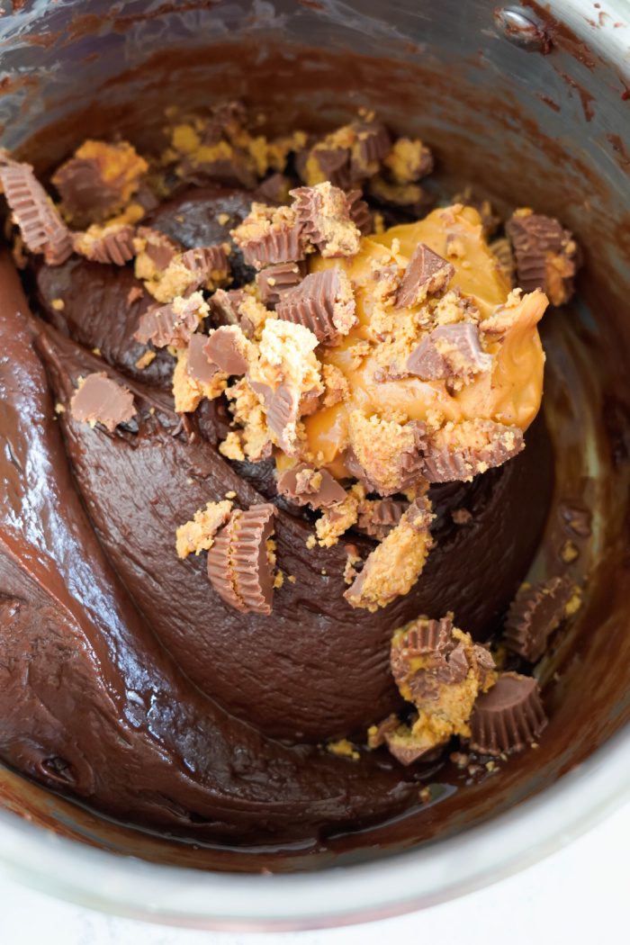 Crushed Reese's and peanut butter added to fudge mixture