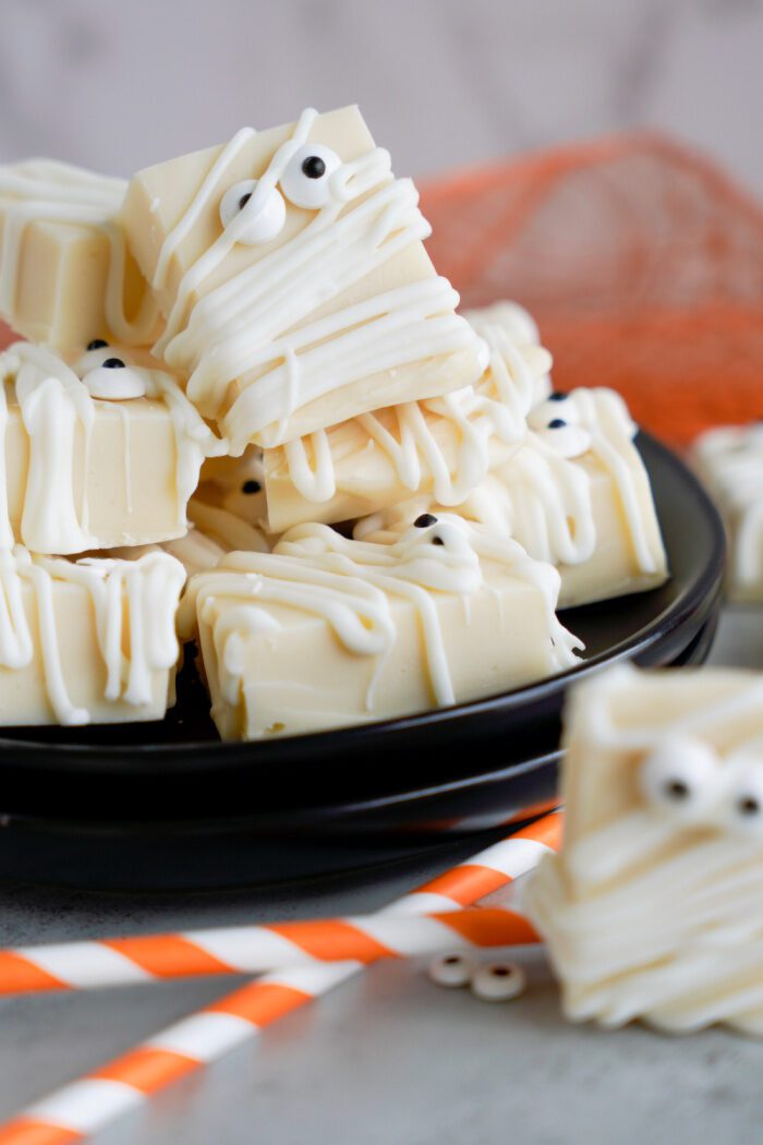 Several White Chocolate Mummy Fudge on a plate