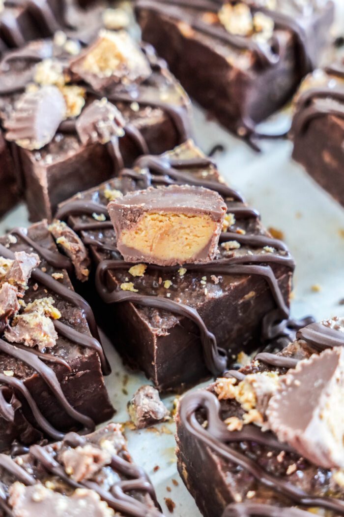 Reese's cups sprinkled over fudge squares