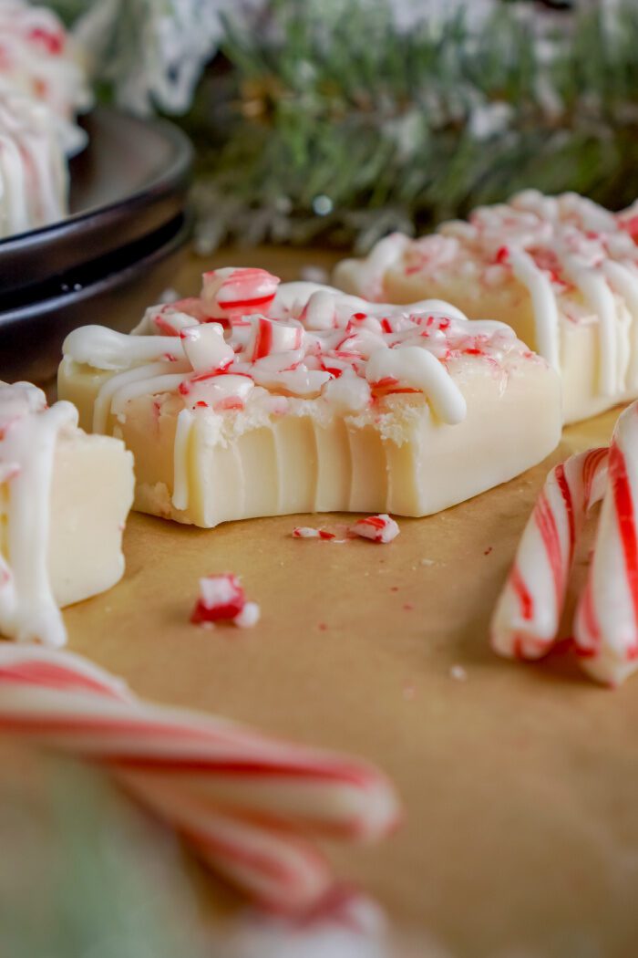 A bite taken out of White Chocolate Candy Cane Fudge square