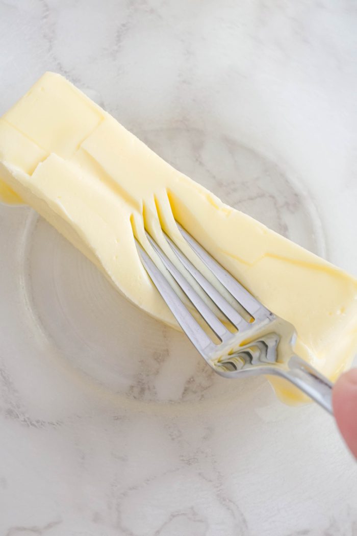 Soften butter in bowl