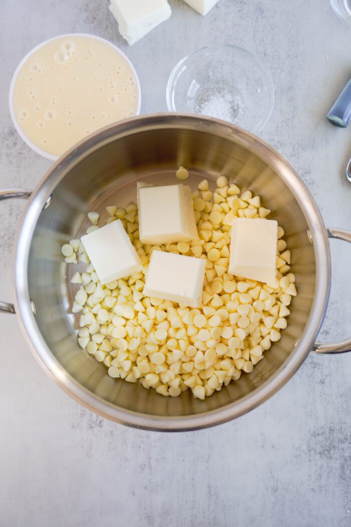 White chocolate chips and almond bark in a pot