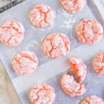 Baked Strawberry Crinkle Cookies on baking sheet