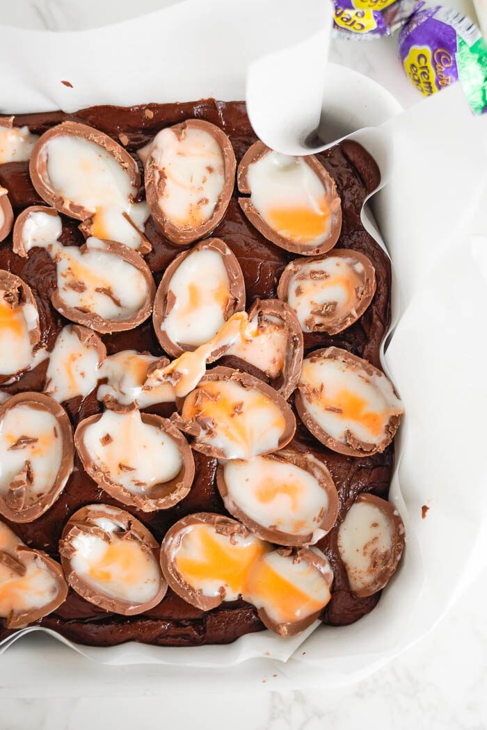 Chocolate brownies topped with Cadbury Creme Eggs.