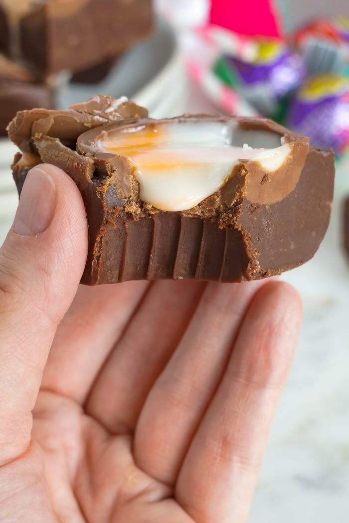 Easter Cadbury Fudge Recipe in Hand with Bite out
