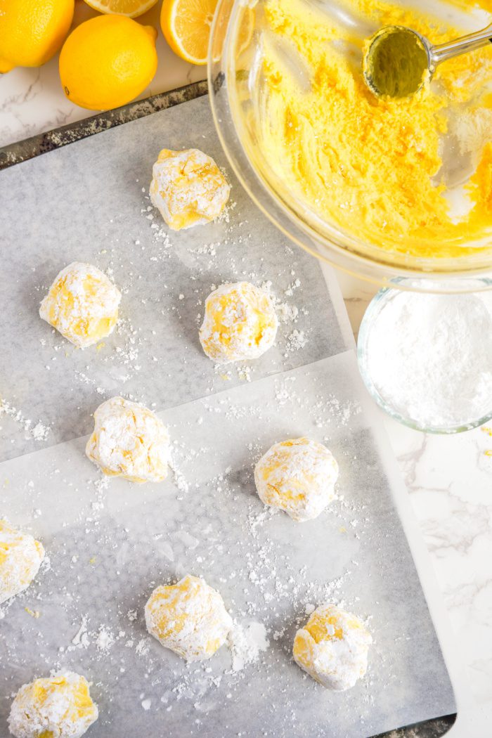Lemon cookie dough balls on baking rack