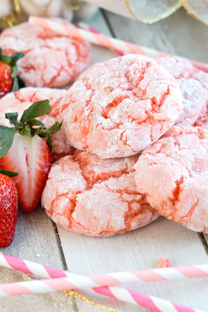 Several Strawberry Crinkle Cookies in a pile