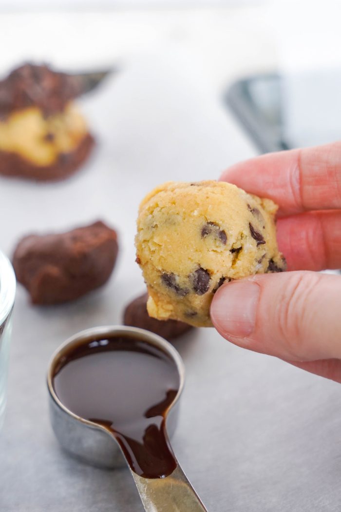 Brookie Cookie dough ball dipped in chocolate sauce