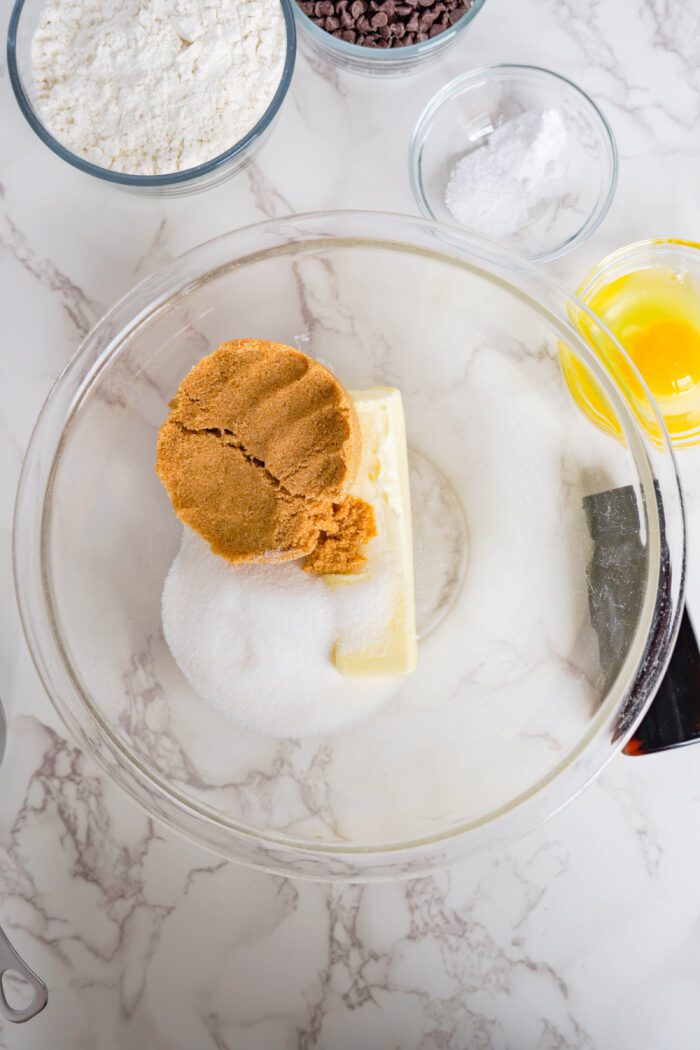 Easy Brookie Cookie mixing sugar together in bowl