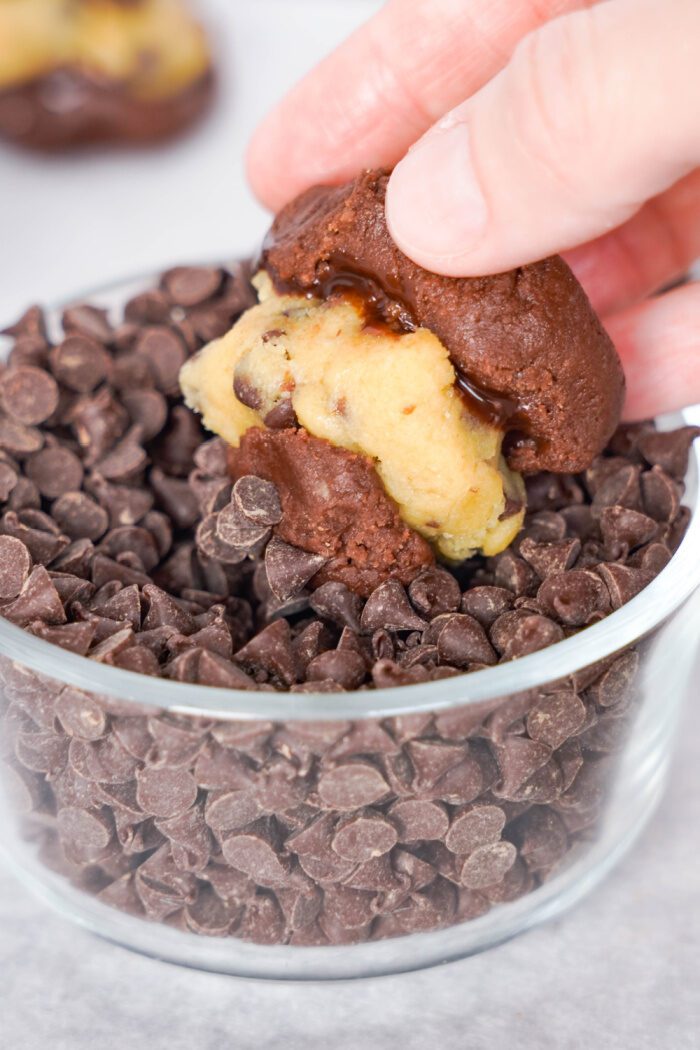 Easy Brookie Cookies rolling in chocolate chips