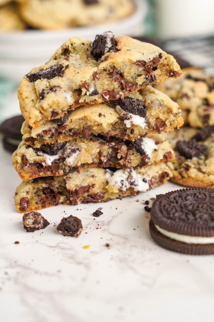 Easy Oreo Chocolate Chip Cookies in stack sliced in half