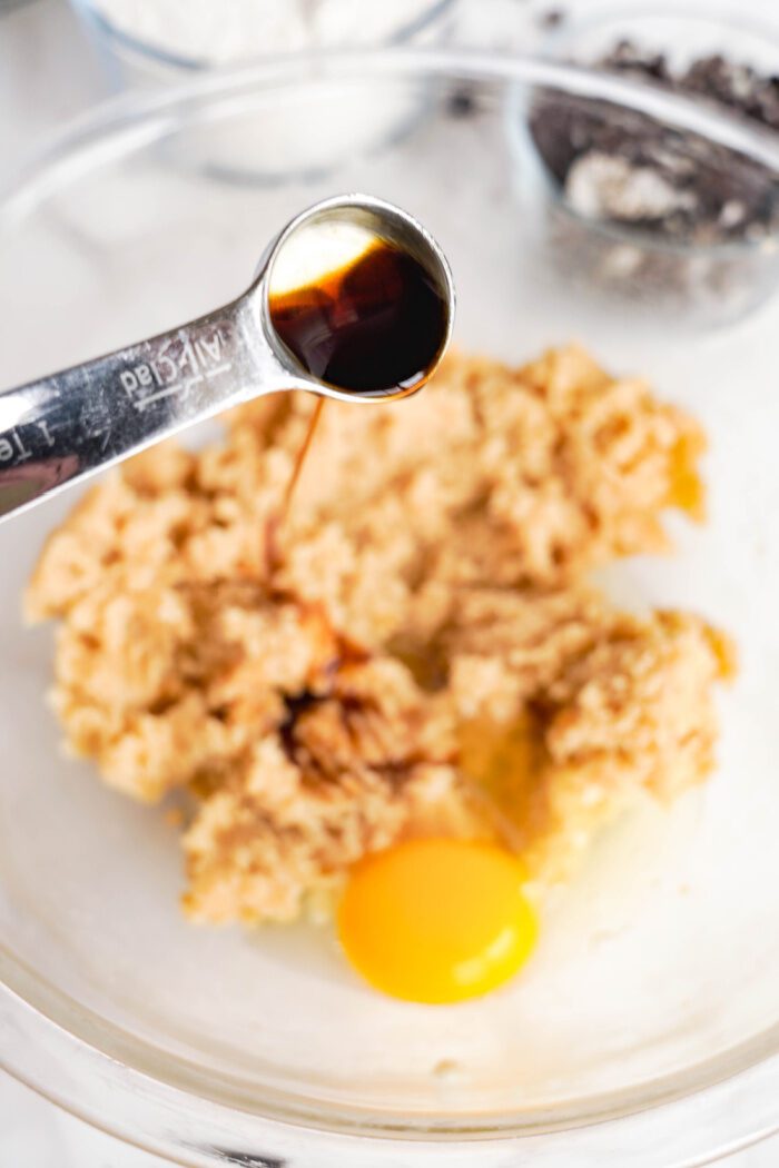 Vanilla and egg added to mixing bowl