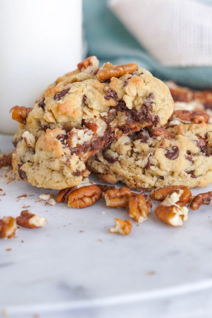 Chocolate Chip Oatmeal Cookie propped up on another cookie